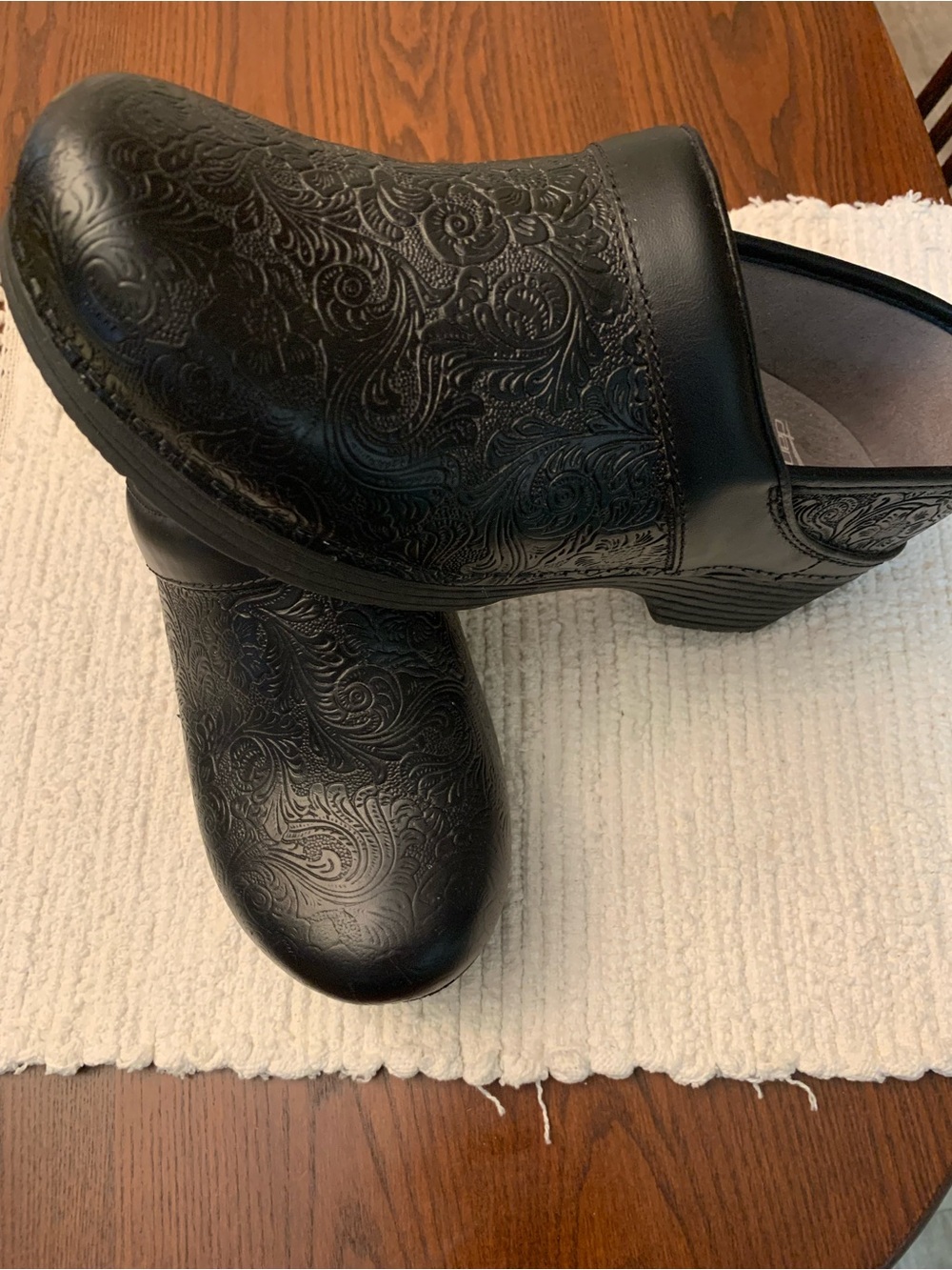 Dansko Black Embossed Leather Slip-On Clogs - Picture 2 of 11